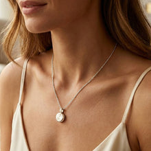 Load image into Gallery viewer, Paw Print Round Urn Ashes Necklace - Silver