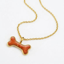 Load image into Gallery viewer, Dog Bone Ashes Resin Necklace - Gold
